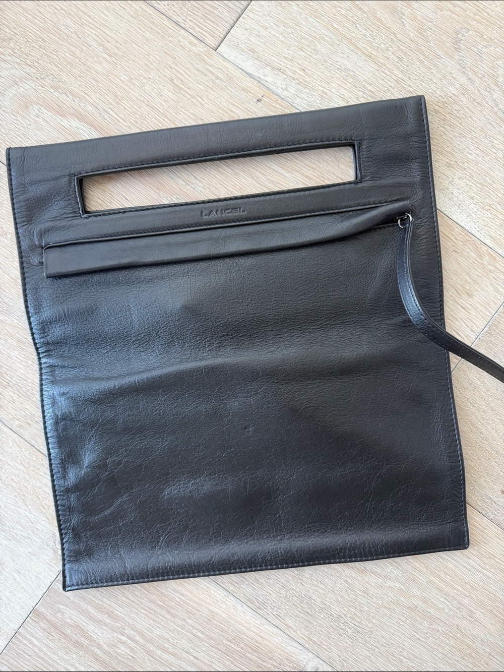 Black Leather Handheld Briefcase Clutch by LANCEL